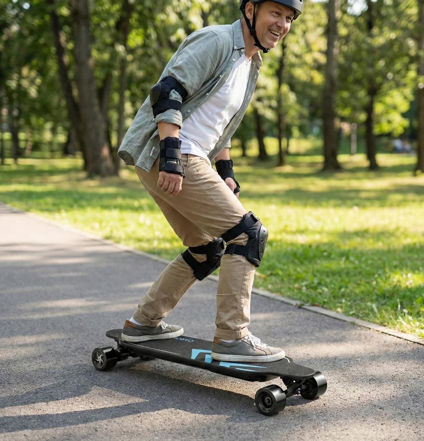 Caroma Skateboard Eléctrico con Control Remoto 1200W Longboard Eléctrico Velocidad Máxima de 28 Mph y Alcance de 16 Millas, Carga Máxima de 300lbs, Papel de Lija Luminoso Adecuado para Adultos y Adolescentes Principiantes (Azul)